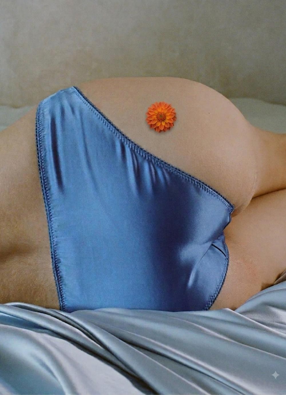 A patch worn on the hip, shaped like a flower.